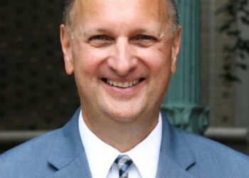 Former Holy Name principal will sign his book