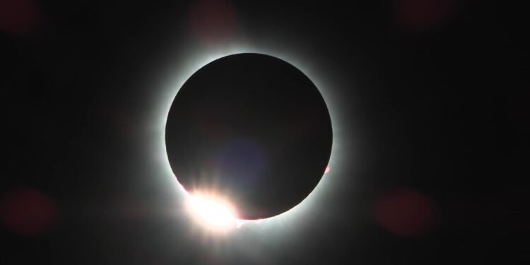 Henderson photographs the eclipse