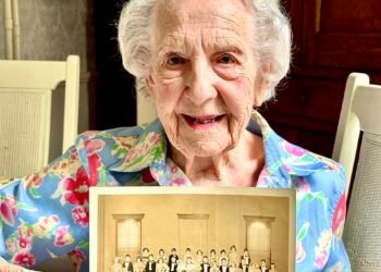 Reader finds 90-year photo of mother in recently borrowed book