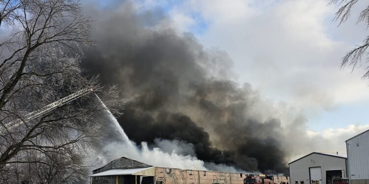 Firefighters battle massive blaze at Budge Industries warehouse