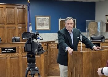 State workplace standards department rules former jailer violated statutes recording hours and paying overtime