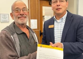 BRIEFS: Patterson recognized as master coroner; 911 fees increase; One lane of Wathen Lane opens; Lacer recognized by HCC; HCS hires McLean Co. schools CFO