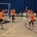 Girls learn volleyball in free, low-stress feeder program