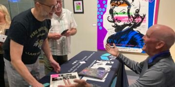 Macy talks socks,1978 UK champs and more during author visit to promote his book