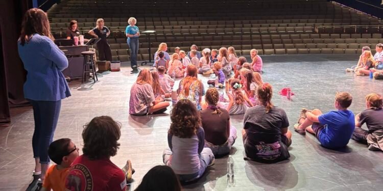 Students and local educators prep for free Friday play at the PAC