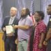 Circle K employee who pushed fiery car away from gas pumps is the city’s Community Spotlight recipient