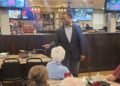 Cameron stumps in Henderson