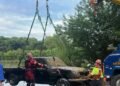 Authorities pull a truck out of Green River and remains inside are believed to be of an Owensboro man missing since 2008