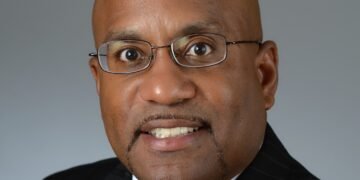 Local achievement: Rev. Charles Johnson; County Attorney Steve Gold; Dorsey Ridley