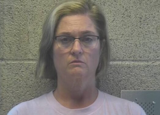 Holy Name teacher charged with domestic assault