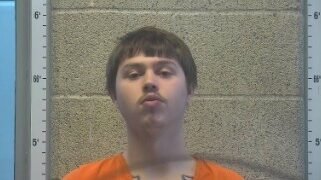 Man who shot at car, injuring passenger, turns himself in