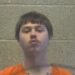 Man who shot at car, injuring passenger, turns himself in