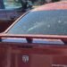 Juvenile is grazed by bullet shot through rear window of car