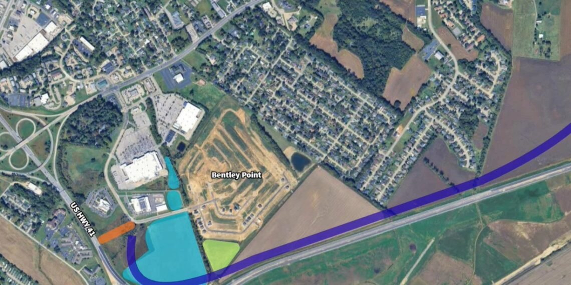 City land behind Walmart rezoned to highway commercial in preparation for development